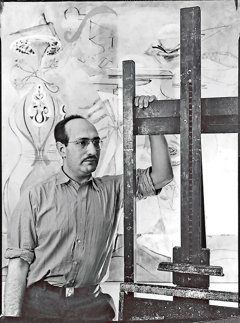 schwarz-weiß Fotografie von Mark Rothko vor einem seiner Gemälde
